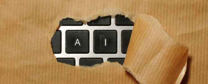 A piece of cardboard with a keyboard appearing through it